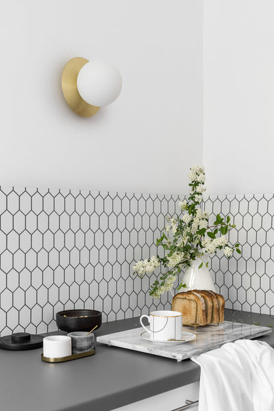 Wall lamp BORRA A modern sconce with brass disk UMMO