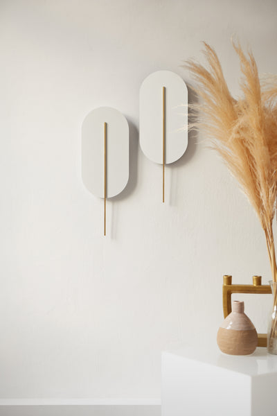 Wall lamp ROKKE white with a brass decorative element UMMO